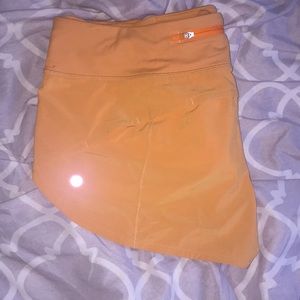 Lululemon size 10 orange speed up shorts
